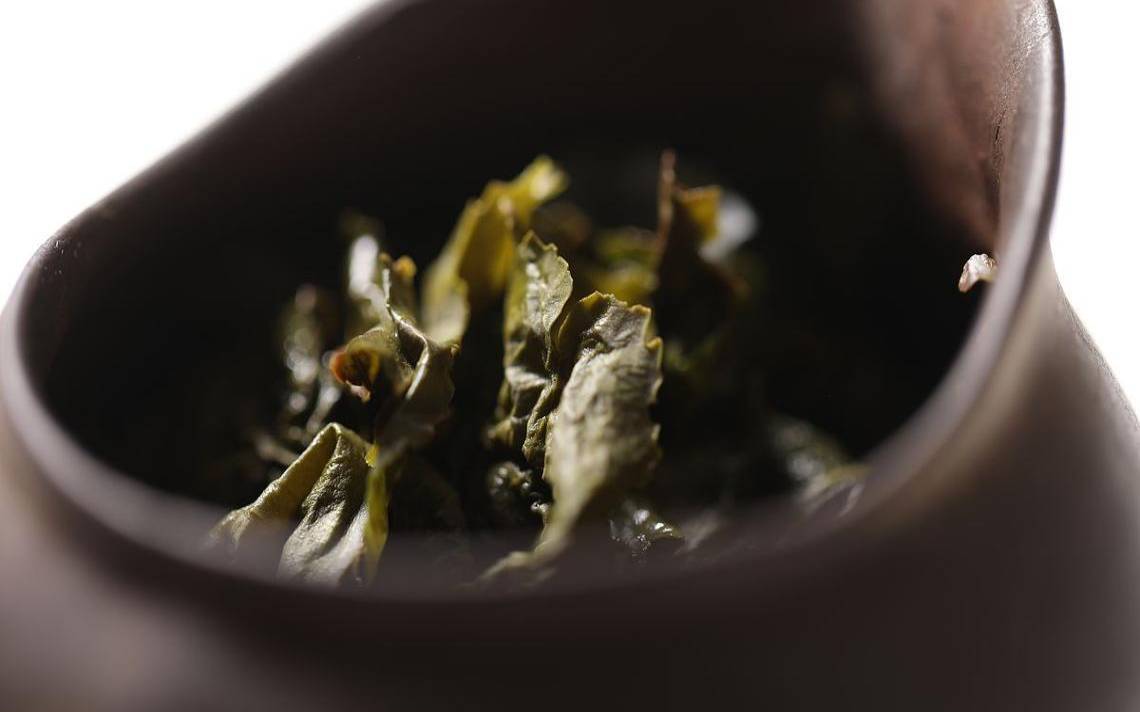 铁观音是绿茶吗吗百度百科,铁观音和红茶哪个好